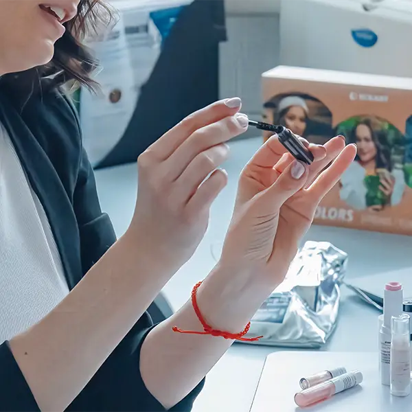 Cosmetic chemist testing formulation