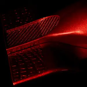 Close up speed shapes coated with Immersion Red pigments.