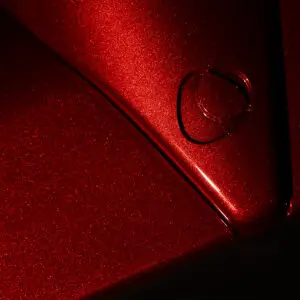 Close up speed shapes coated with Immersion Red pigments.