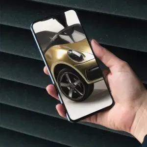 Close up of a phone with an image of a bobby car coated with metallic effect pigments